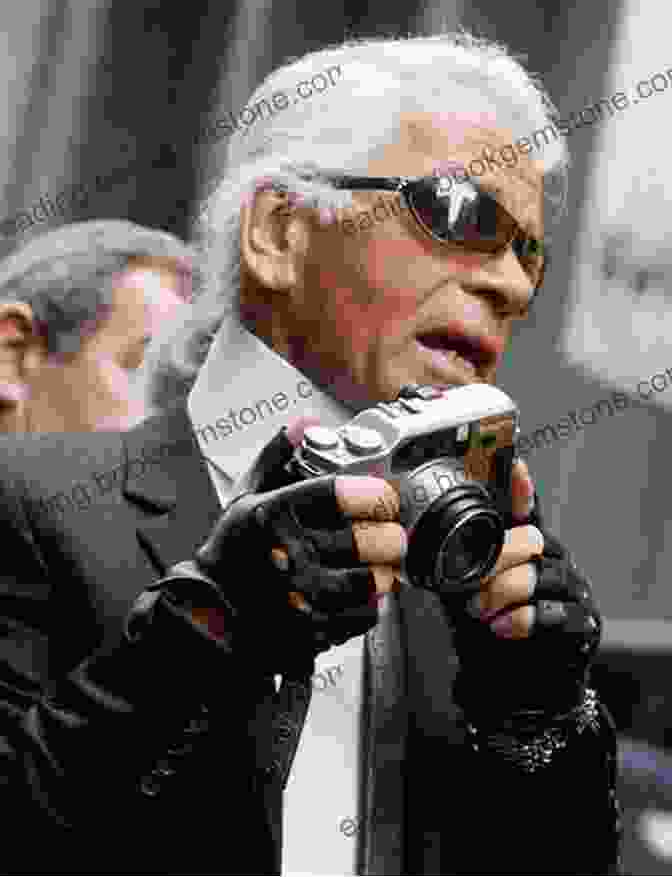 A Close Up Photograph Of Karl Lagerfeld's Face, With His Sunglasses Reflecting A Camera. Kaiser Karl: The Life Of Karl Lagerfeld