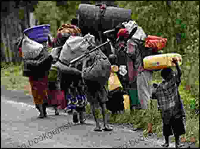A Group Of Maya People Walking Along A Road, Carrying Their Belongings. Maya Exodus: Indigenous Struggle For Citizenship In Chiapas