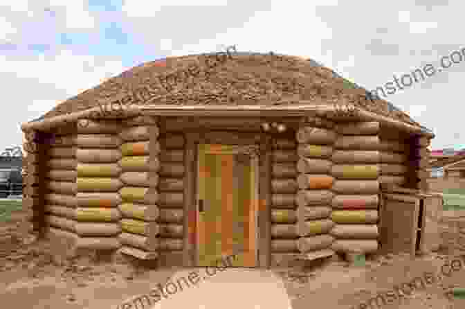 A Group Of Native Americans Gathered Outside A Traditional Hogan, A Dome Shaped Dwelling Made Of Logs And Mud. They Are Dressed In Traditional Clothing, With Colorful Blankets And Jewelry. The Land Of Little Rain (Modern Library Classics)