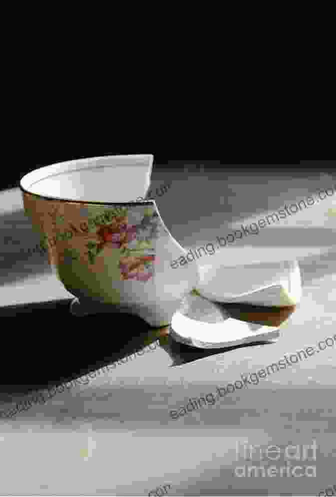 A Photo Of A Broken Teacup. Lost In Translation: An Illustrated Compendium Of Untranslatable Words From Around The World
