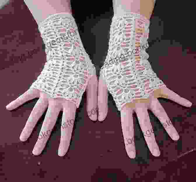 Image Of Lacy Fingerless Gloves Crocheted In A Fine White Thread, Displaying Their Intricate Lacework And Delicate Appearance. Crochet Fingerless Gloves: Simple Fingerless Gloves Patterns To Crochet